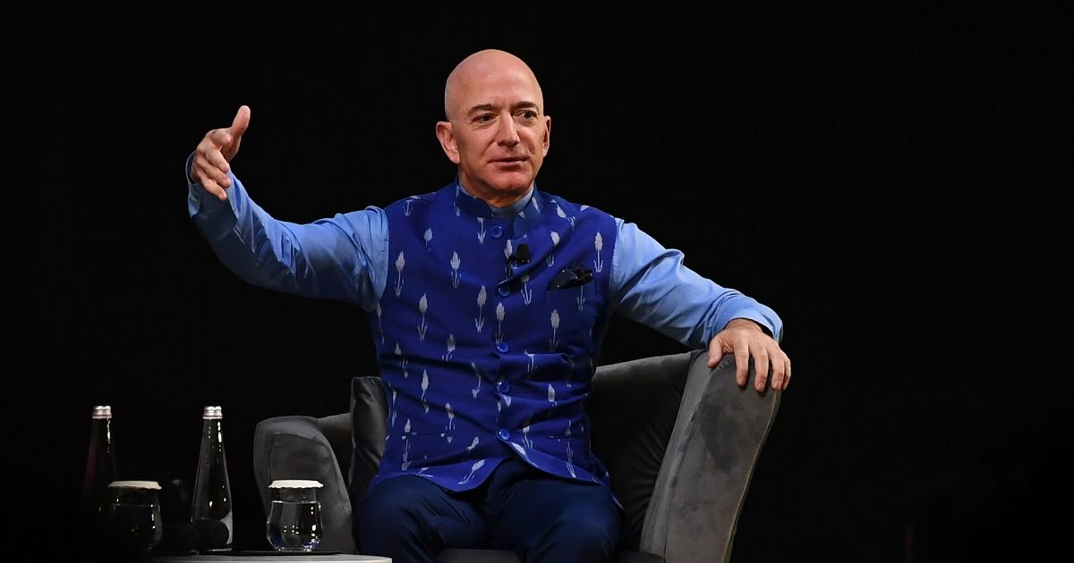 Amazon CEO Jeff Bezos gestures as he addresses the Amazon's annual Smbhav event in New Delhi on Jan. 15, 2020.