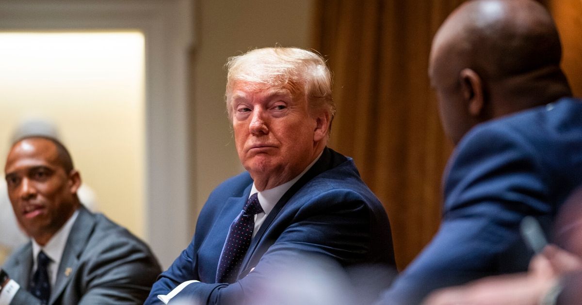 President Donald Trump listens during a meeting in the Cabinet Room of the White House on May 18, 2020, in Washington, D.C.