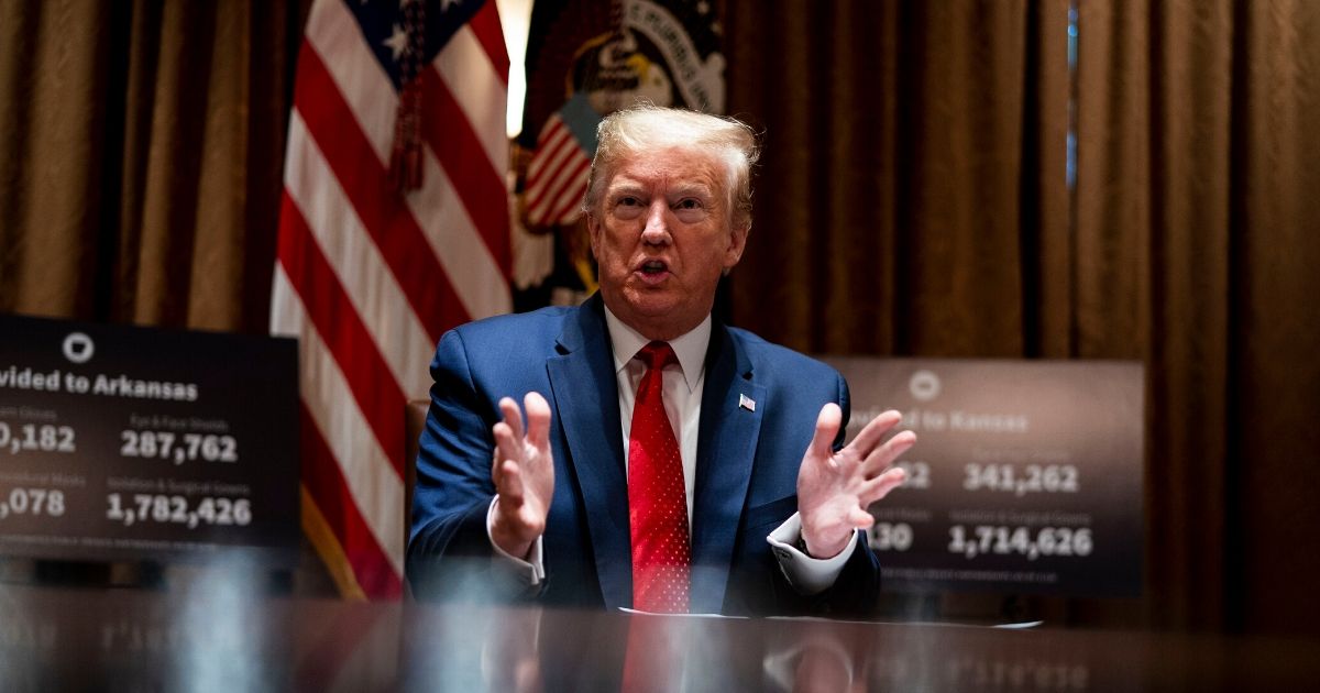 President Donald Trump makes remarks as he attends a meeting with the Arkansas Gov. Asa Hutchinson and Kansas Gov. Laura Kelly in the Cabinet Room of the White House on May 20, 2020, in Washington, D.C.