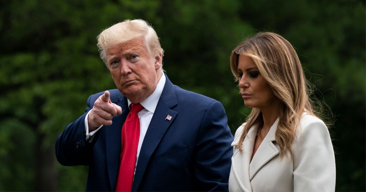 President Donald Trump and first lady Melania Trump arrive to the South Lawn of the White House after a trip to Baltimore on May 25, 2020, in Washington, D.C.