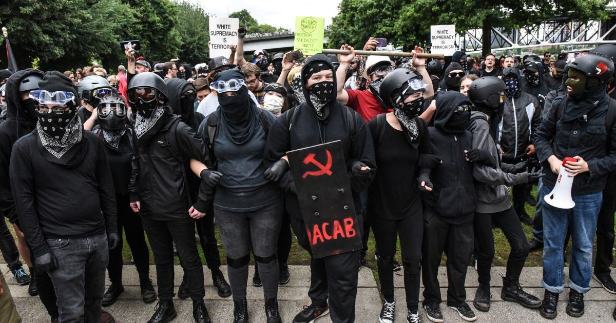 Members of the "anti-fascist" group known as antifa are pictured in Portland, Oregon, in an August 2019 file photo.