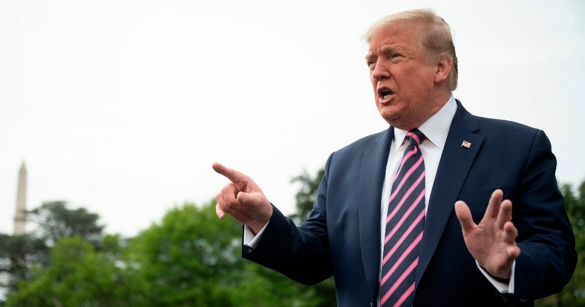 President Donald Trump speaks as he departs the White House on May 5, 2020, in Washington, D.C., en route to Arizona, where he will tour a mask factory and hold a roundtable on Native American issues.