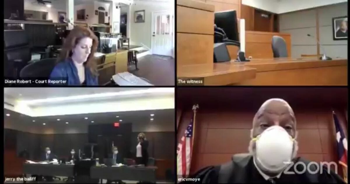 Salon owner Shelley Luther, bottom left, appears in court over a Zoom video call and hears from District Judge Eric Moyé.