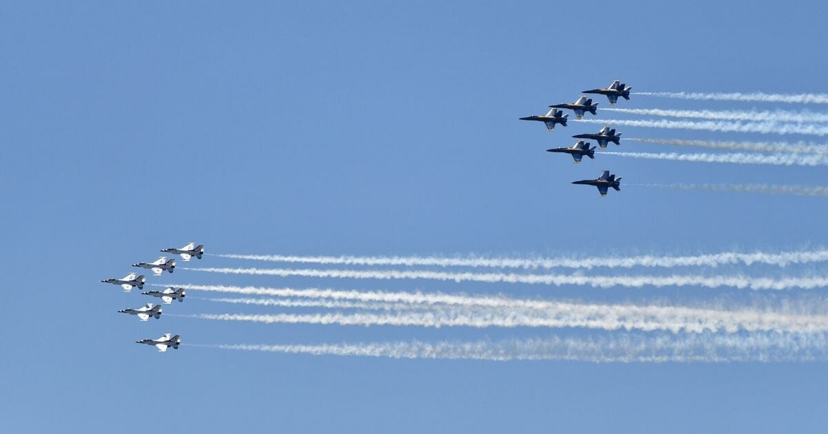 U.S. Air Force Thunderbirds and U.S. Navy Blue Angels perform a flyover tribute during the COVID-19 pandemic on May 2, 2020, in Atlanta.