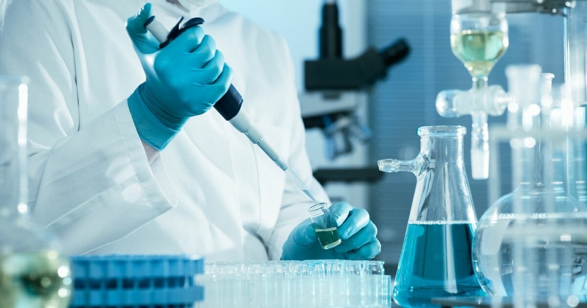 Stock image of a scientist working in a lab.