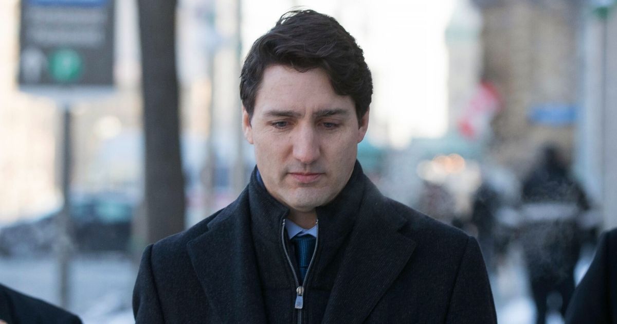 Canadian Prime Minister Justin Trudeau walks to a news conference from the prime minister's office in Ottawa, Ontario, on March 7, 2019.