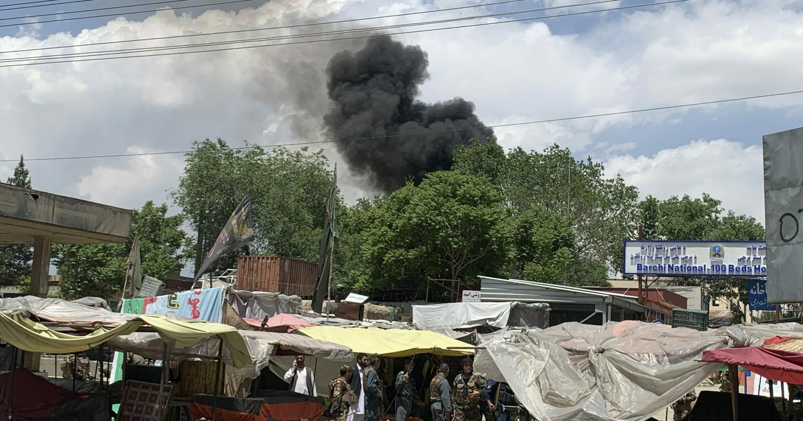 Smokes rises from a hospital after gunmen attacked in Kabul, Afghanistan, on May 12, 2020. Gunmen stormed the hospital in the western part of the Afghan capital setting off a gun battle with the police, officials said.