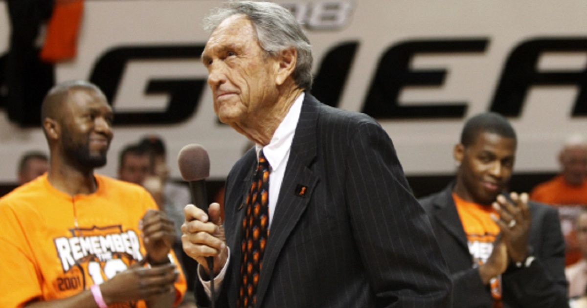 Former Oklahoma State basketball coach Eddie Sutton pauses while talking to fans during a Jan 26, 2011, ceremony honoring the 10th anniversary of the death of 10 members of the Oklahoma State basketball program in a plane crash.