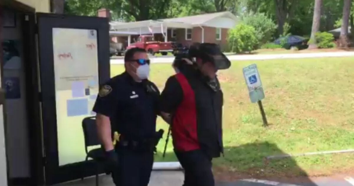 American law enforcement personnel seem to have gotten liberal with the handcuffs once again this week, arresting a North Carolina small business owner for opening up shop amid the ongoing COVID-19 pandemic.