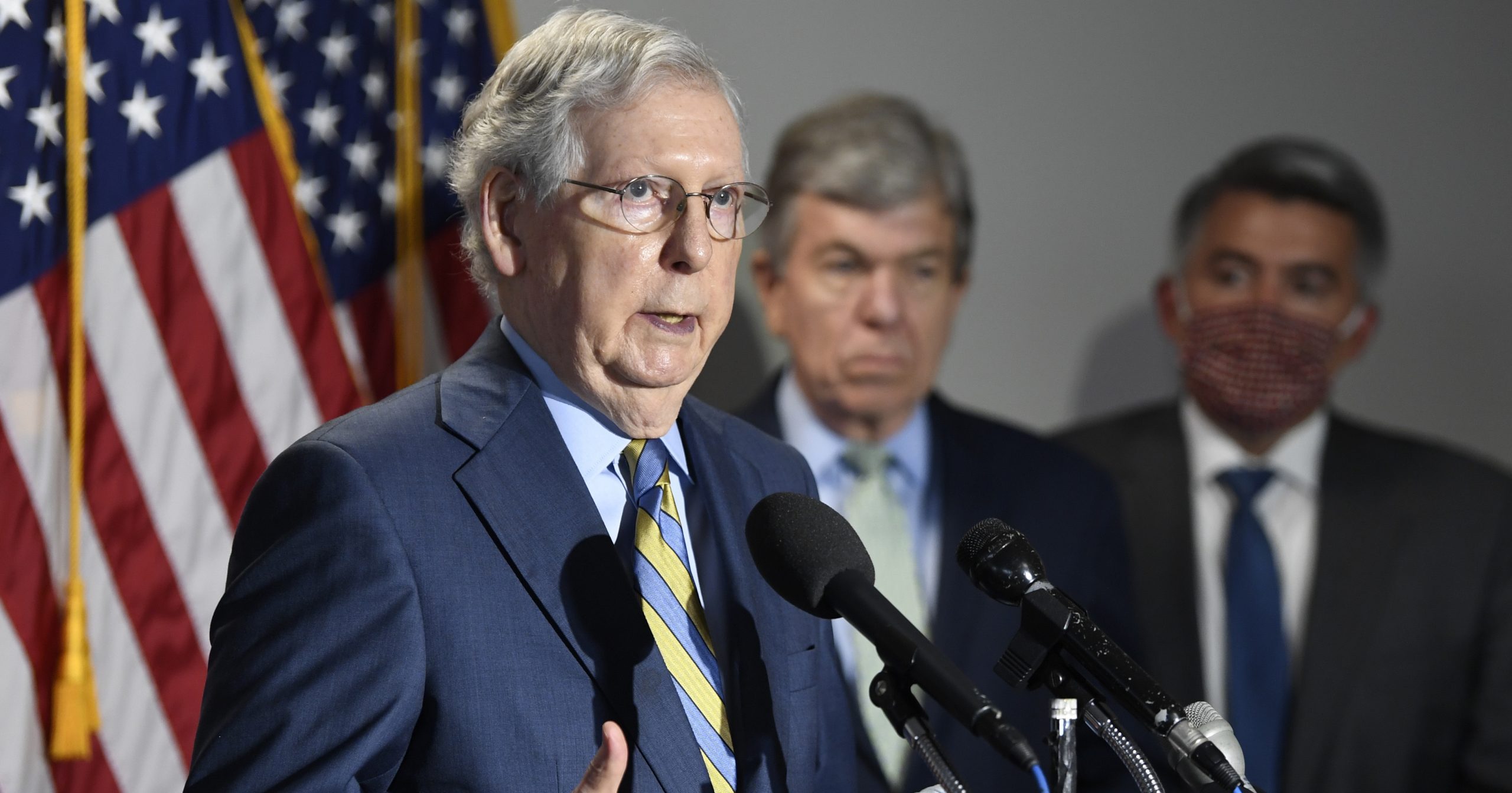 Senate Majority Leader Mitch McConnell of Kentucky, left, speaks to reporters following the weekly Republican policy luncheon on Capitol Hill in Washington, D.C., on June 9, 2020.