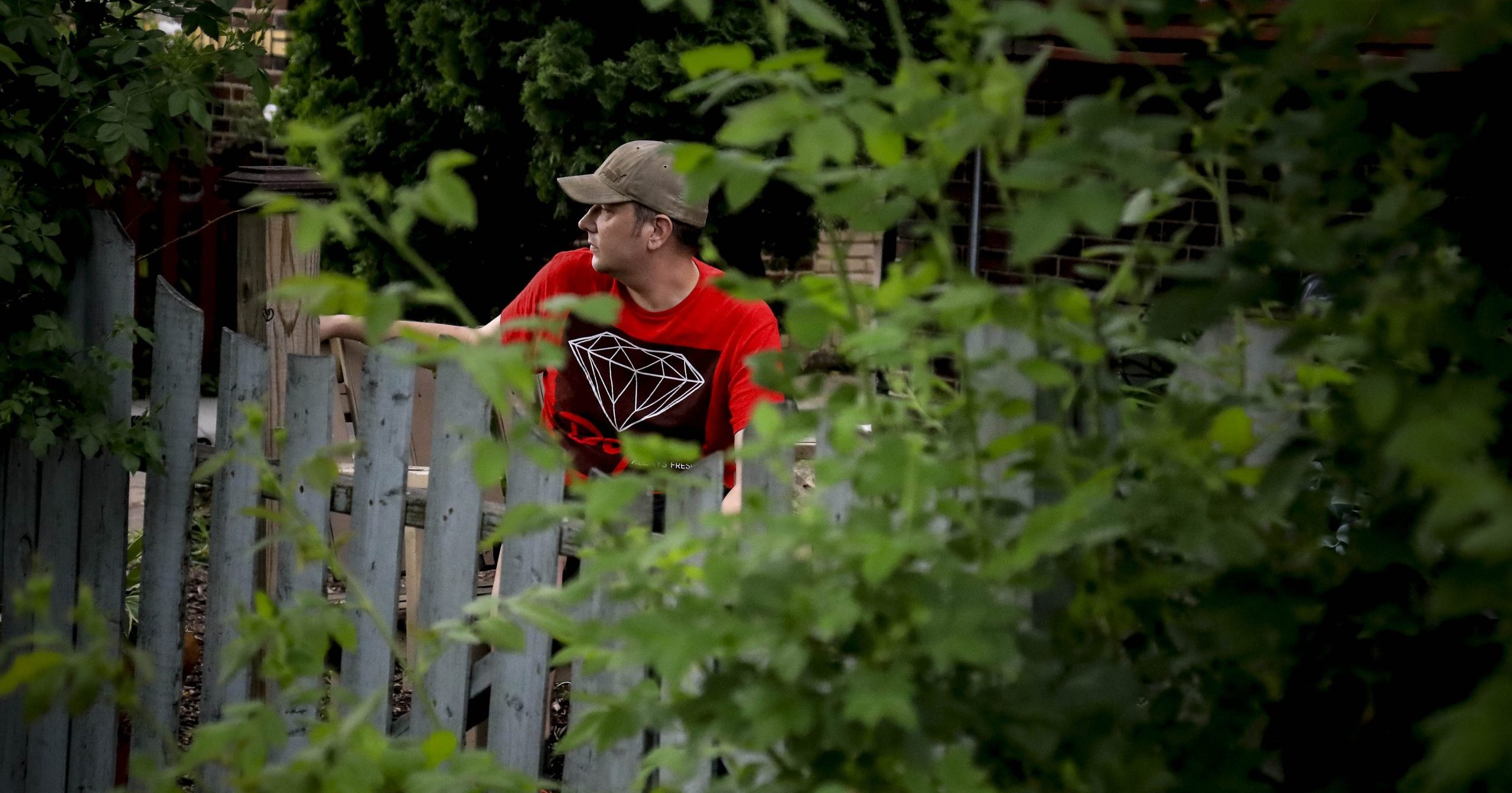 Michael Grunke looks out from his home to the streets around his neighborhood, where he has joined neighbors to form a watch group, on June 2, 2020, in Minneapolis, Minnesota.