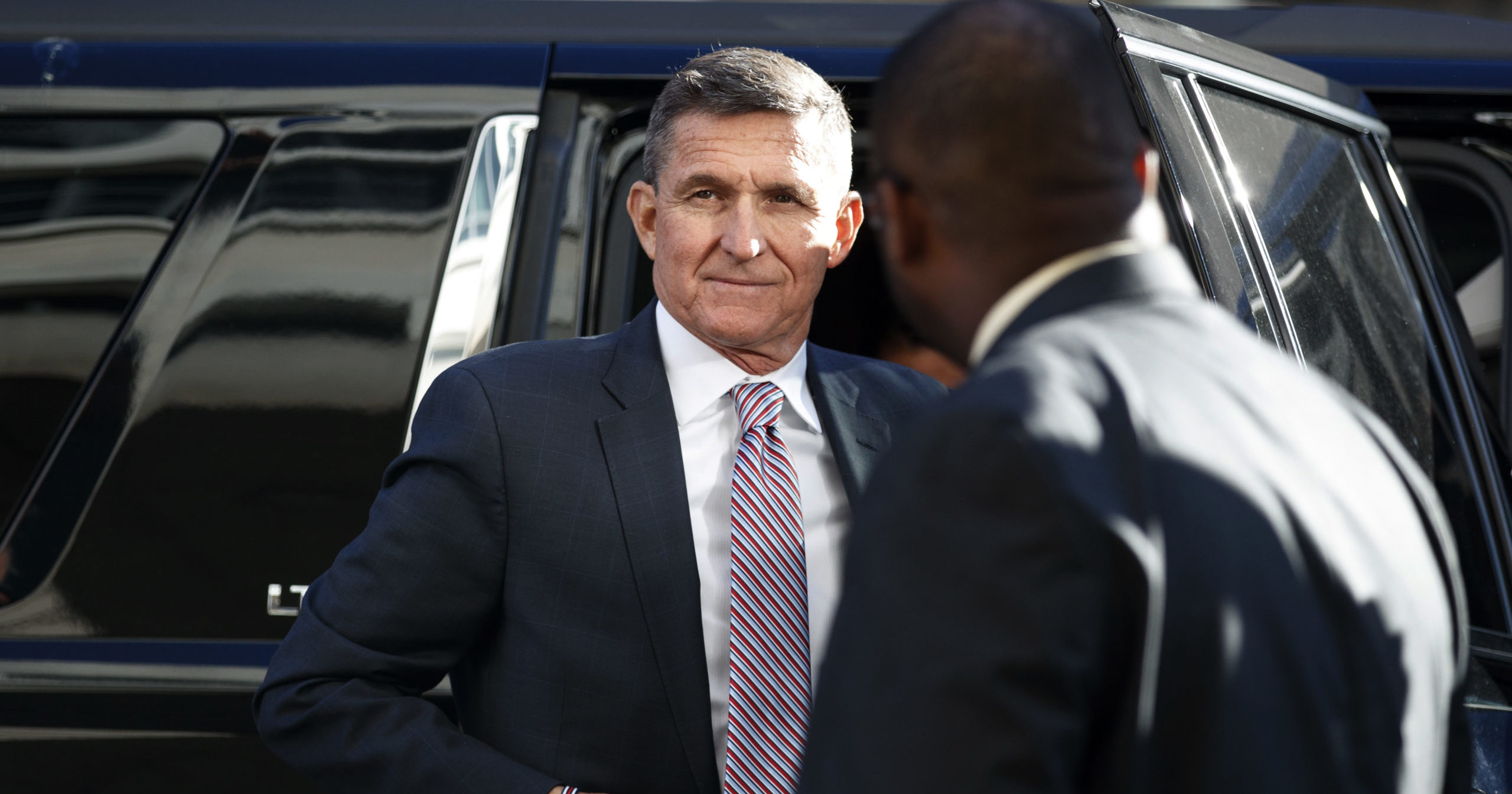 In this Dec. 18, 2018, file photo, President Donald Trump's former national security advisor, Michael Flynn, arrives at federal court in Washington.