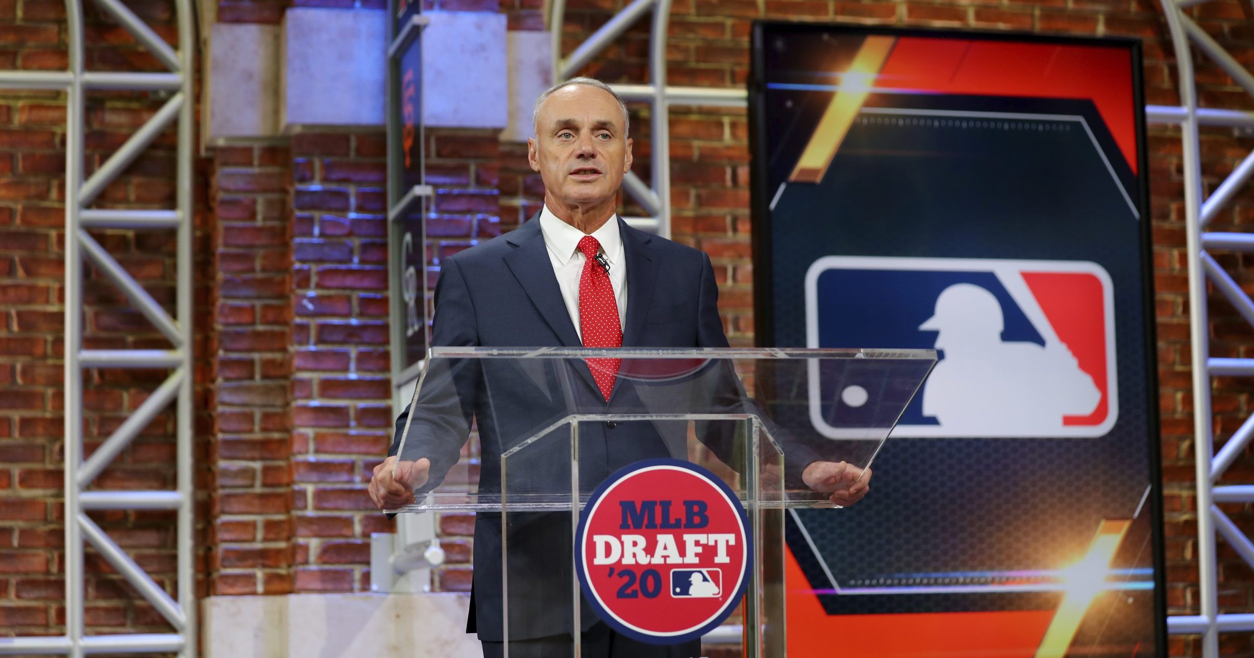 Baseball Commissioner Robert D. Manfred Jr. makes an opening statement during the baseball draft Wednesday, June 10, 2020, in Secaucus, New Jersey.