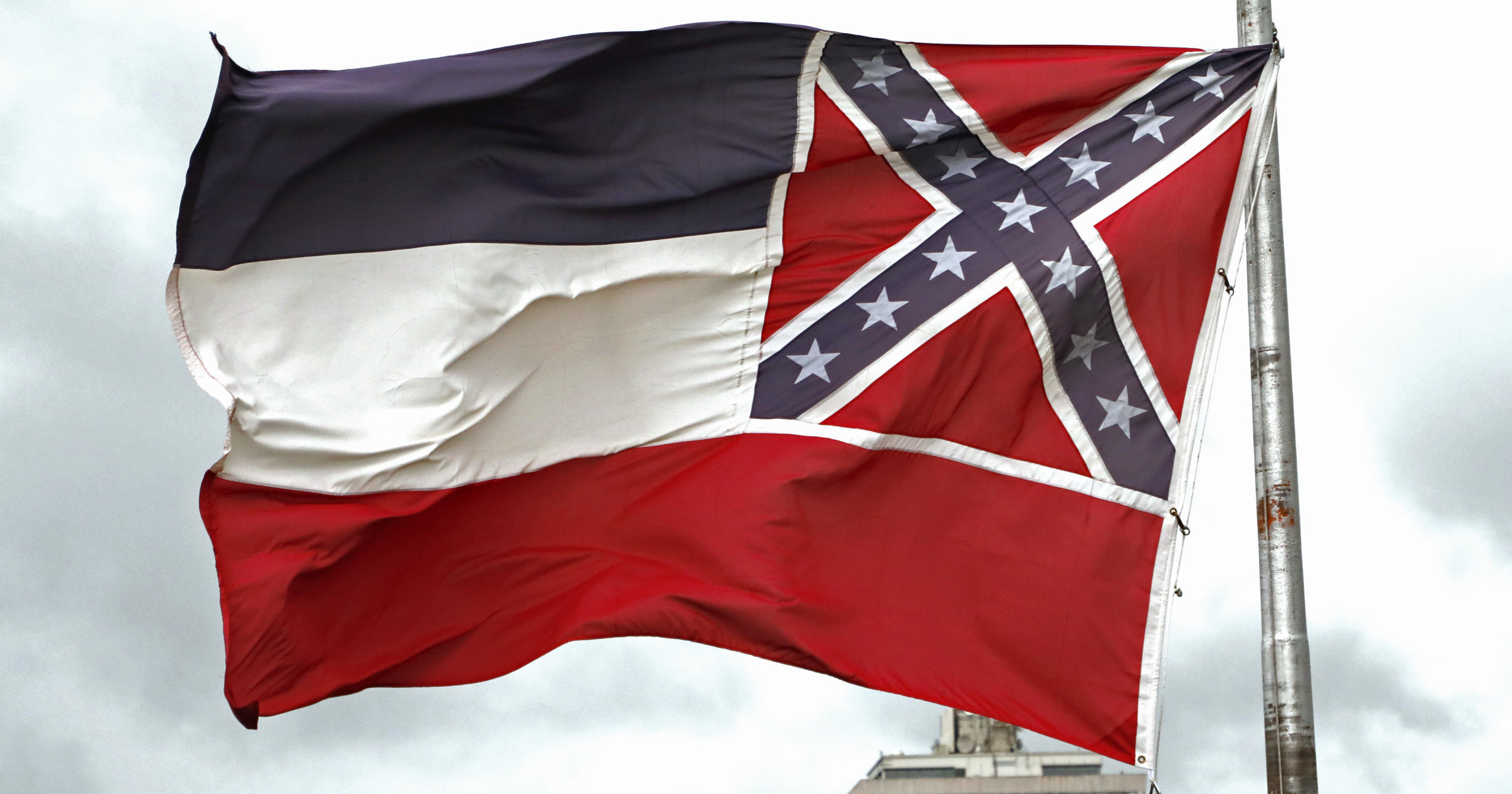 A Mississippi state flag flies outside the Capitol in Jackson, Mississippi, on June 25, 2020.