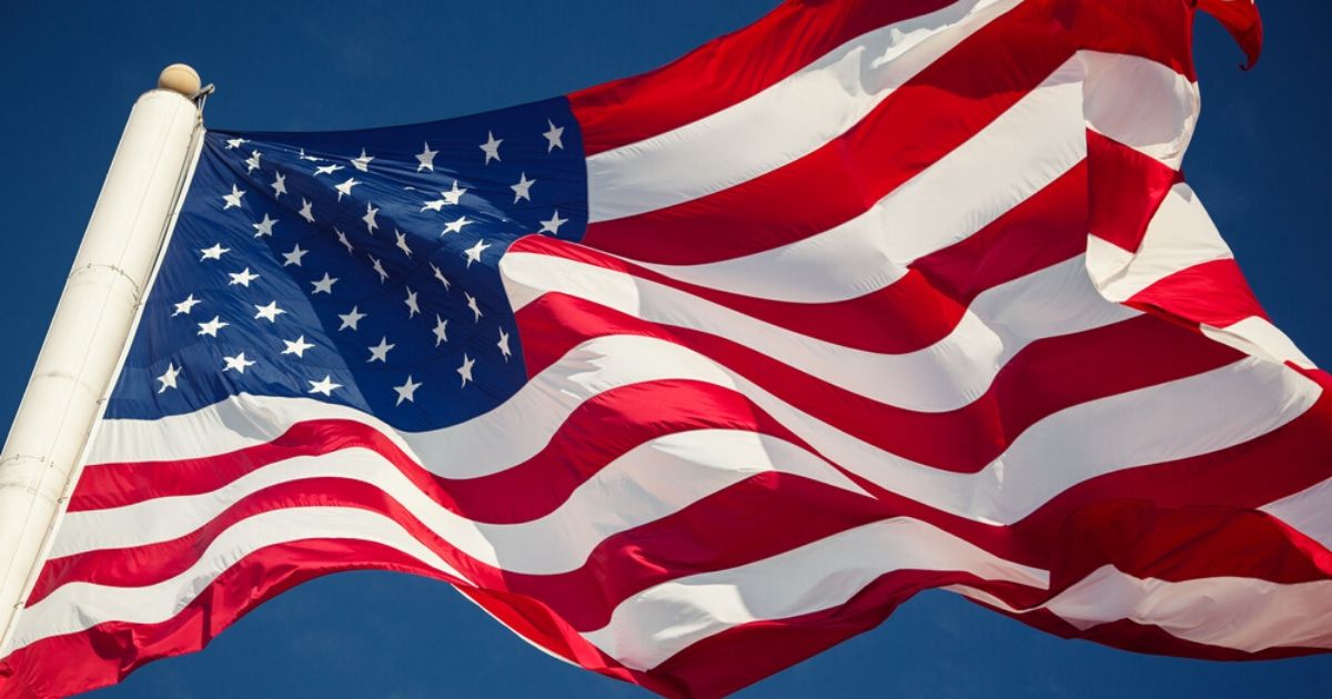 An American flag is seen in the stock image above.