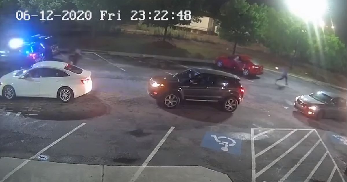 Video of a police shooting in Atlanta shows the shooting victim actually turned and aimed a stolen Taser at a pursuing officer.