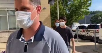 Brian Bartels, 20, heads to the police station in Pittsburgh.