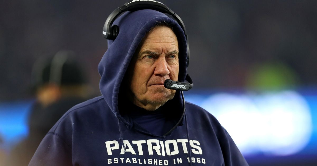 Head coach Bill Belichick of the New England Patriots looks on during the AFC Wild Card Playoff game against the Tennessee Titans at Gillette Stadium on Jan. 4, 2020, in Foxborough, Massachusetts.
