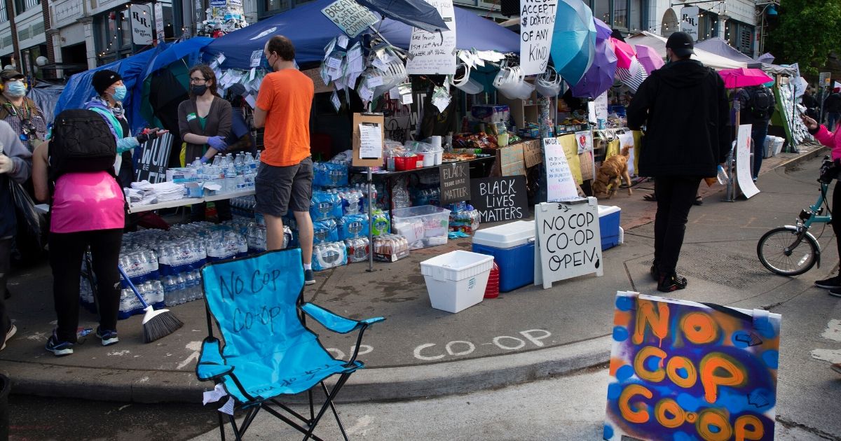 Free water, masks and food are available at the No-Cop Co-op in an area dubbed the Capitol Hill Autonomous Zone on June 12, 2020, in Seattle, Washington.