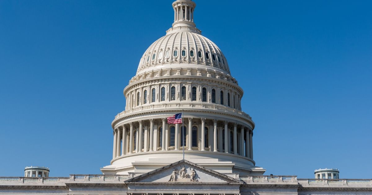 A stock photo of the U.S. Capitol Building is seen above.