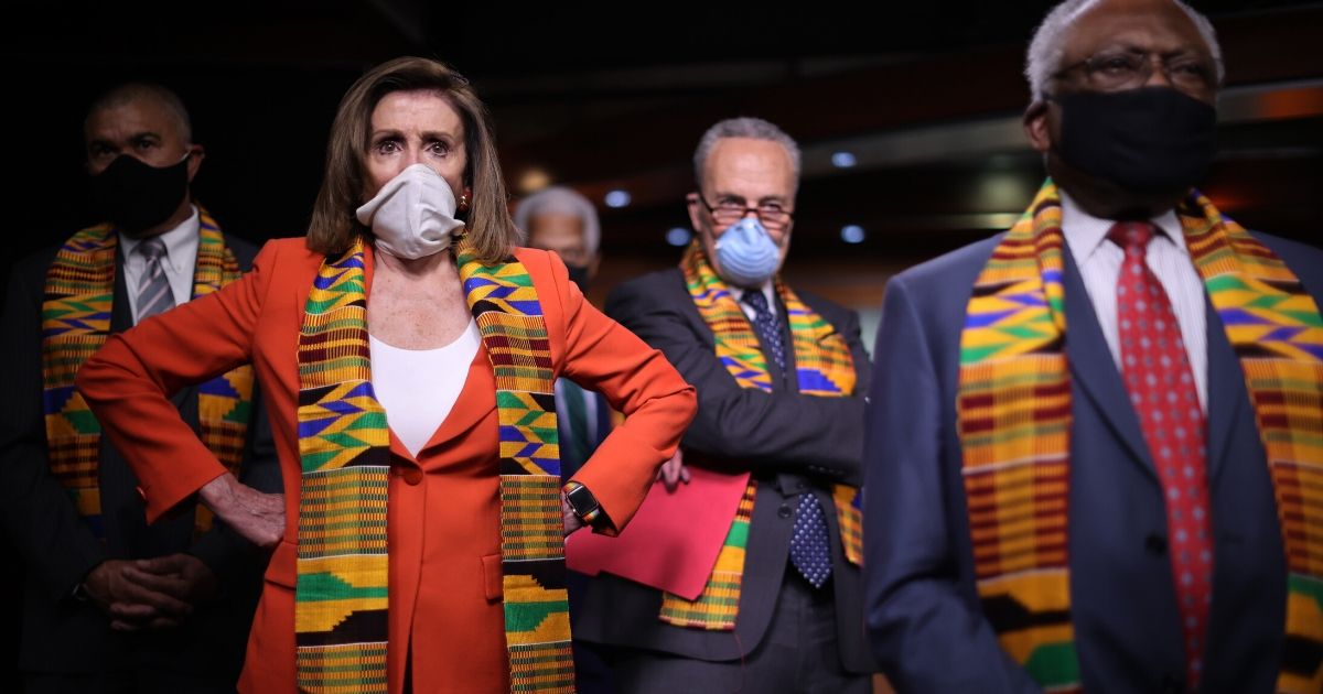 House Speaker Nancy Pelosi joins fellow Democrats, from left, Rep. Lacy Clay of Missouri, Senate Minority Leader Charles Schumer of New York and House Majority Whip James Clyburn of South Carolina to announce the Justice in Policing Act at the Capitol in Washington on June 8, 2020.