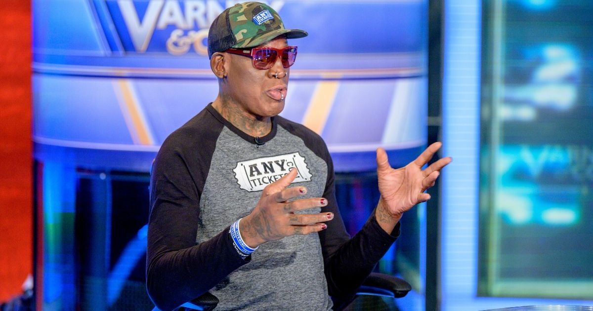 Former NBA player Dennis Rodman Visits "Varney & Co." with guest-host David Asman at Fox Business Network Studios on Sept. 18, 2019, in New York City.