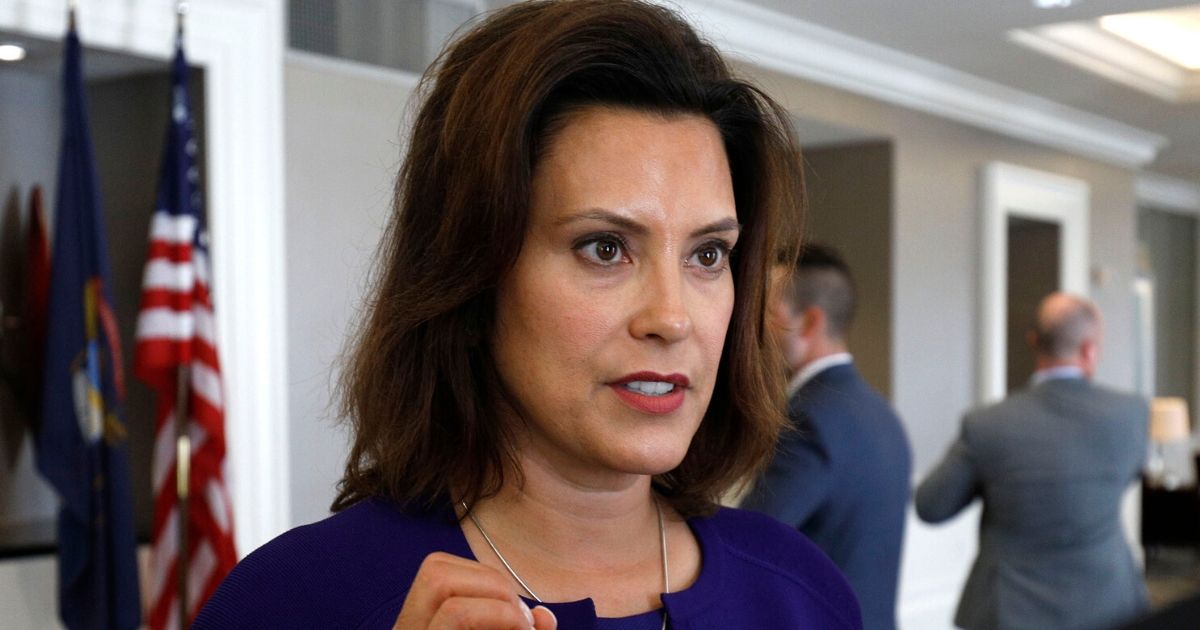 Gretchen Whitmer speaks with a reporter at the Westin Book Cadillac Hotel on Aug. 8, 2018, in Detroit, Michigan.