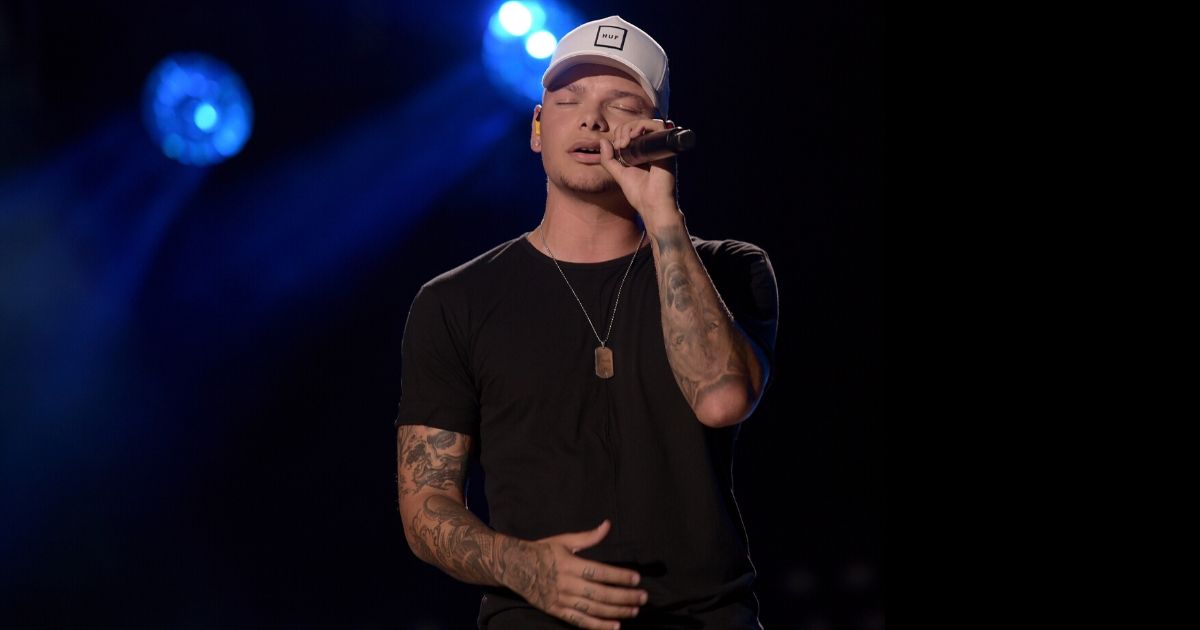 Singer-songwriter Kane Brown performs onstage during the CMA Music festival at the Nissan Stadium in Nashville, Tennessee, on June 7, 2018.