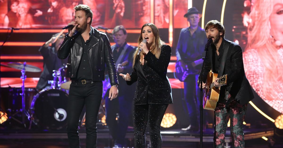 From left to right, Charles Kelley, Hillary Scott and Dave Haywood of the band Lady Antebellum, now called "Lady A," perform onstage during the 2019 CMT Artists of the Year at Schermerhorn Symphony Center on Oct. 16, 2019, in Nashville, Tennessee.