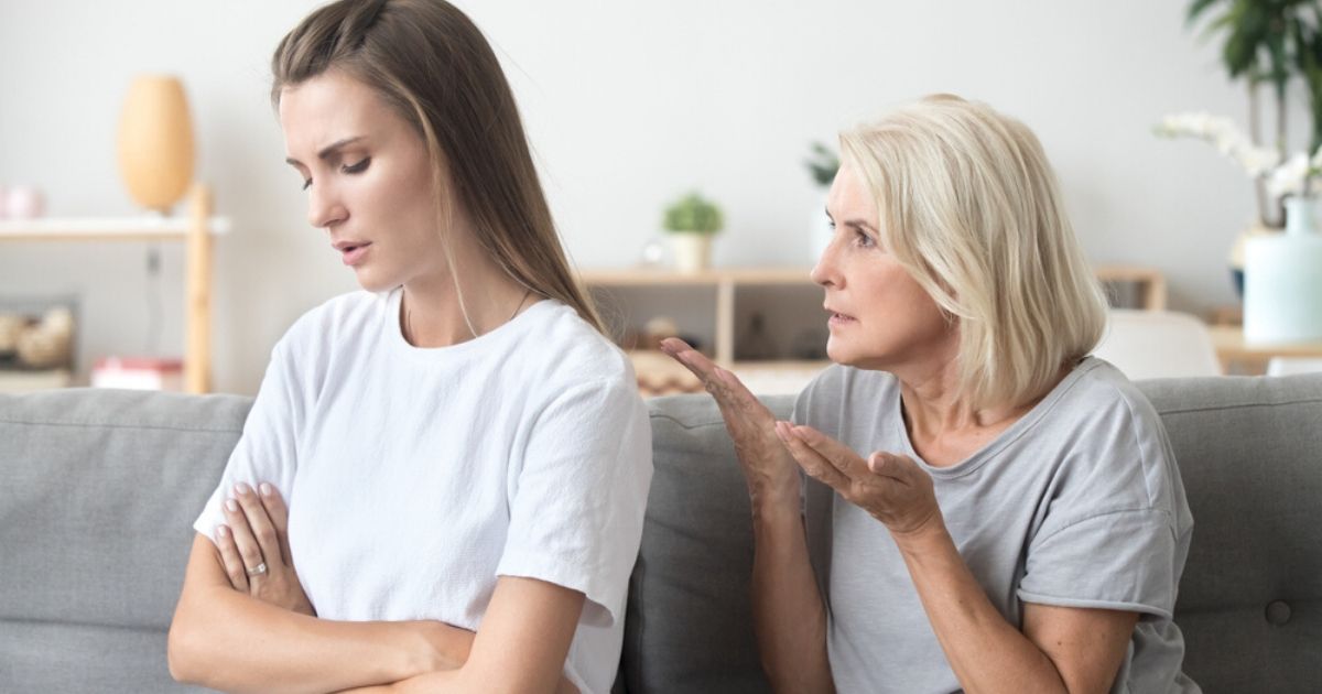 A woman ignores her mother in the stock image above.