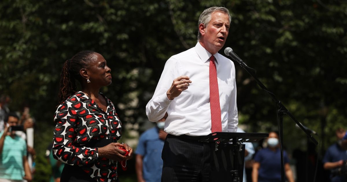 New York Mayor Bill de Blasio speaks to an estimated 10,000 people