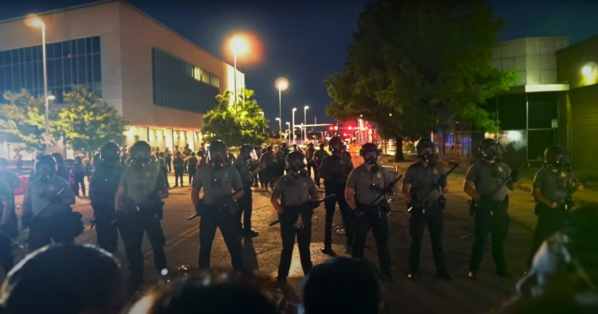 Police confront violent protesters in Oklahoma City.