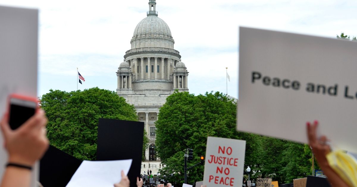 Protesters march to the state house during a Black Lives Matter rally in Providence, Rhode Island, on June 5, 2020.