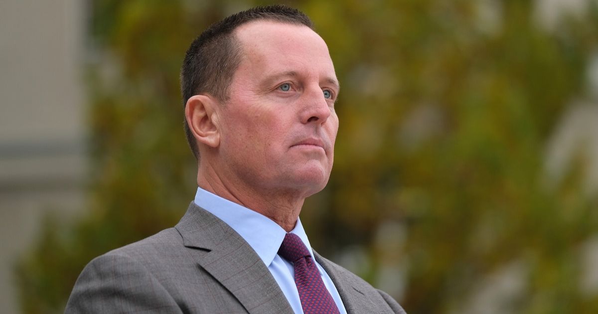 Then-U.S. Ambassador to Germany Richard Grenell waits for the arrival of Secretary of State Mike Pompeo for talks with German Defense Minister Annegret Kramp-Karrenbauer at the Federal Defense Ministry on Nov. 8, 2019, in Berlin, Germany.