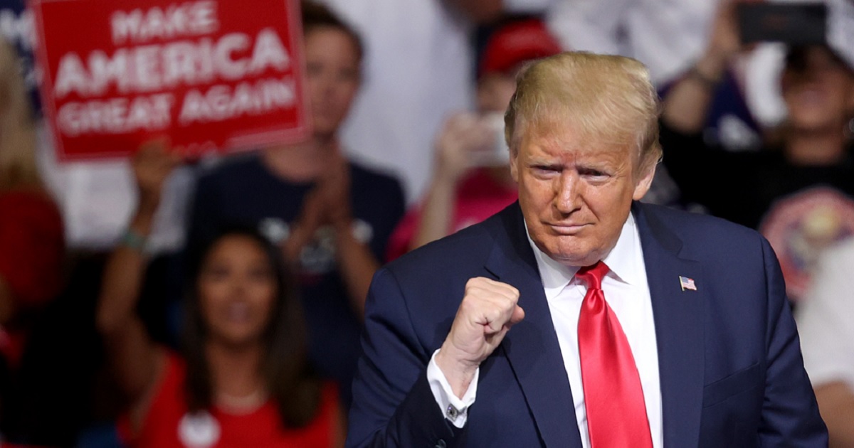 President Donald Trump gestures to the crowd early in his appearance Saturday in Tulsa, Oklahoma.