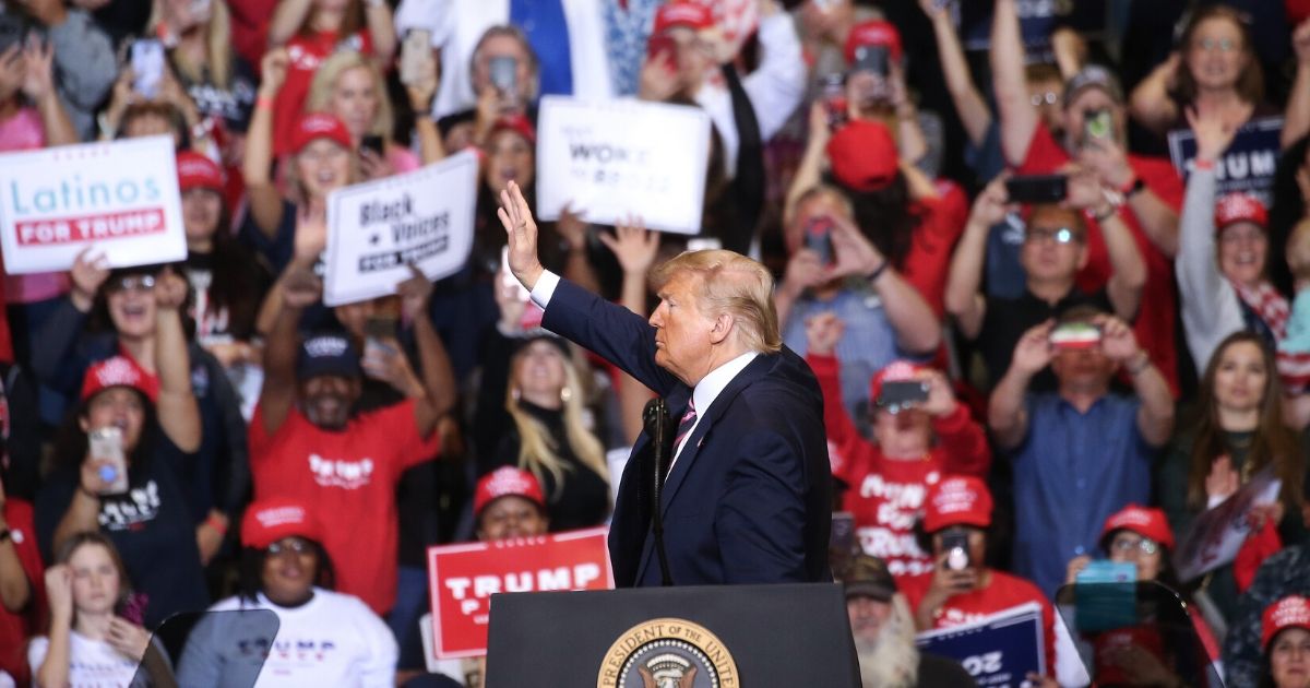 President Donald Trump waves to supporters during a rally at the Las Vegas Convention Center on Feb. 21, 2020.