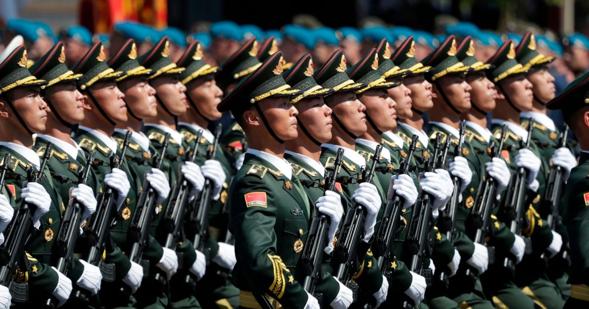 Soldiers from China's People's Liberation Army march on Red Square during a military parade in Moscow on June 24, 2020.