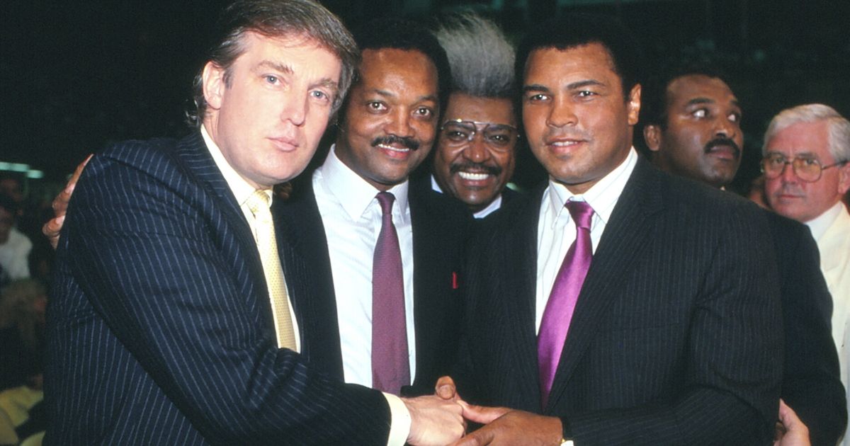 Businessman Donald Trump, the Rev. Jesse Jackson, boxing promoter Don King and former heavyweight champion Muhammad Ali pose at ringside at the Mike Tyson-Larry Holmes match at Convention Hall in Atlantic City, New Jersey, in 1988.