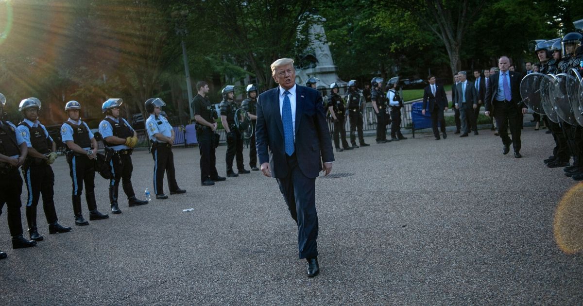 President Donald Trump leaves the White House on foot to go to St John's Episcopal Church across Lafayette Square in Washington on Monday.