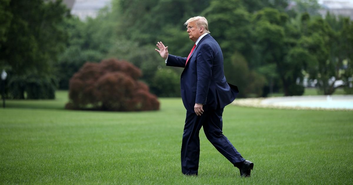 President Donald Trump walks across the South Lawn before boarding Marine One and departing the White House on June 5, 2020, in Washington, D.C.