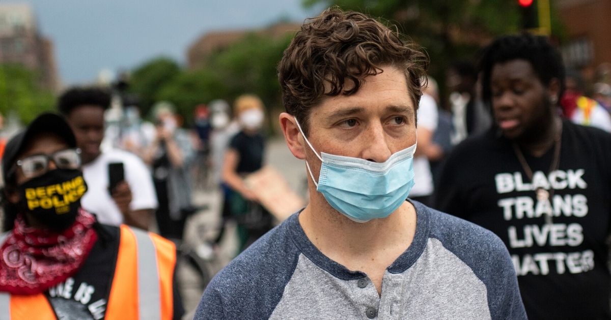 Minneapolis Mayor Jacob Frey attends a demonstration Saturday calling for the Minneapolis Police Department to be defunded.