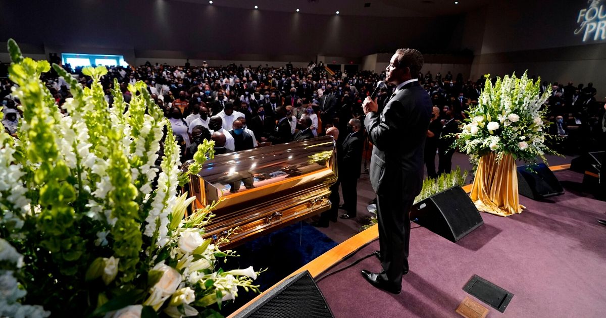 Senior pastor Dr. Remus Wright speaks during a funeral service for George Floyd at The Fountain of Praise church on June 9, 2020, in Houston.