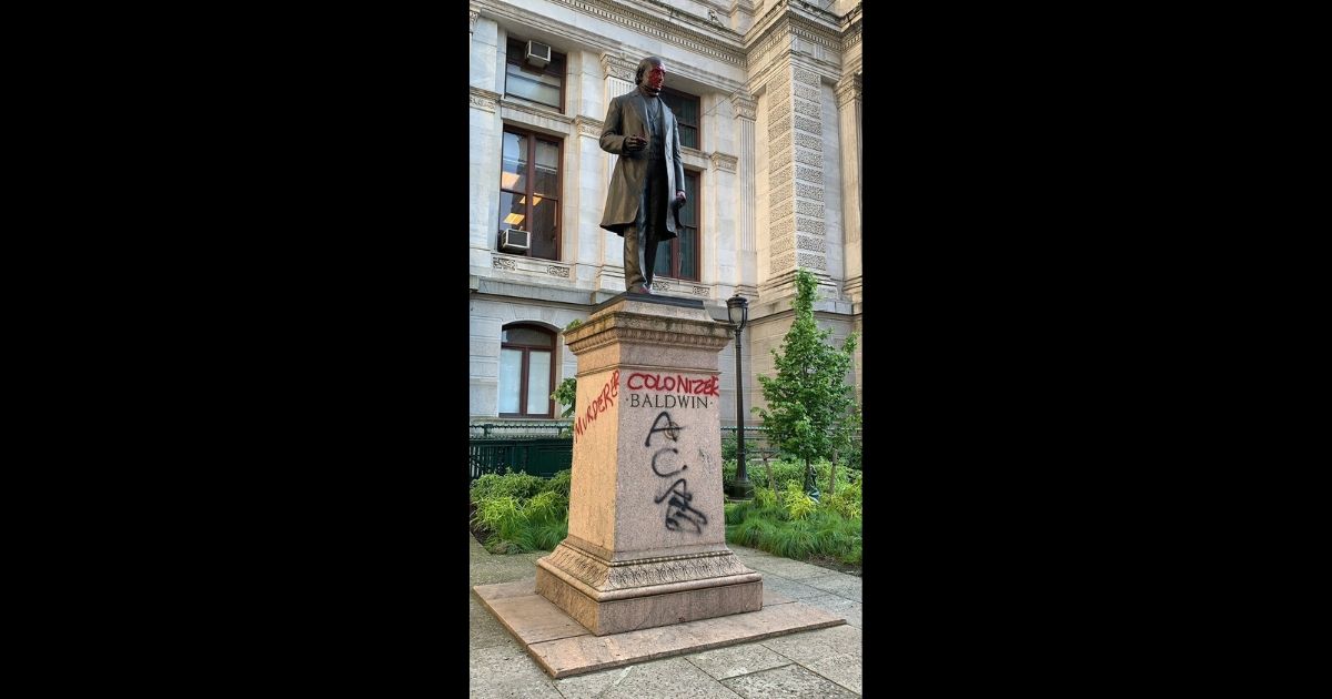 A statute of abolitionist Matthias Baldwin stands defaced in Philadelphia.