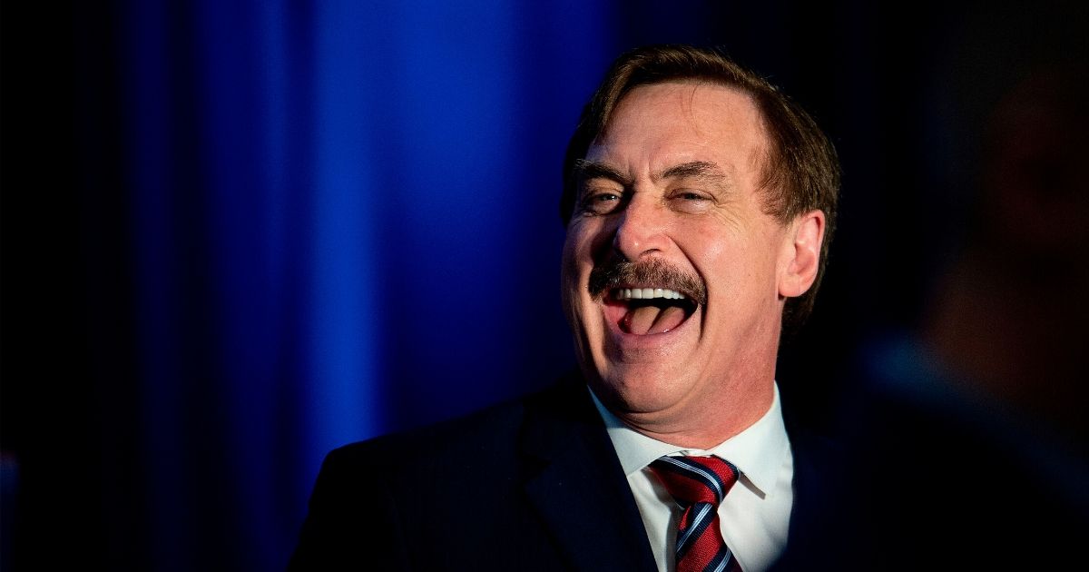 MyPillow CEO Michael Lindell laughs during a "Keep Iowa Great" news conference in Des Moines, Iowa, on Feb. 3, 2020.