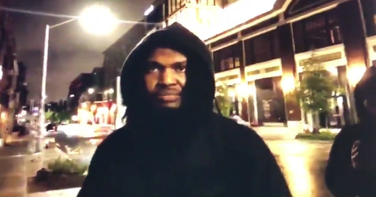 Seattle rapper Raz Simone confronts a man in the city's "Capitol Hill Autonomous Zone."