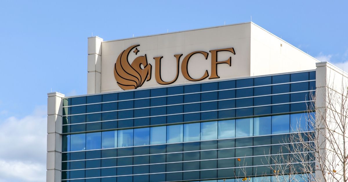 The sign and logo of the University of Central Florida on the building at Lake Nona Campus in Orlando, Florida.