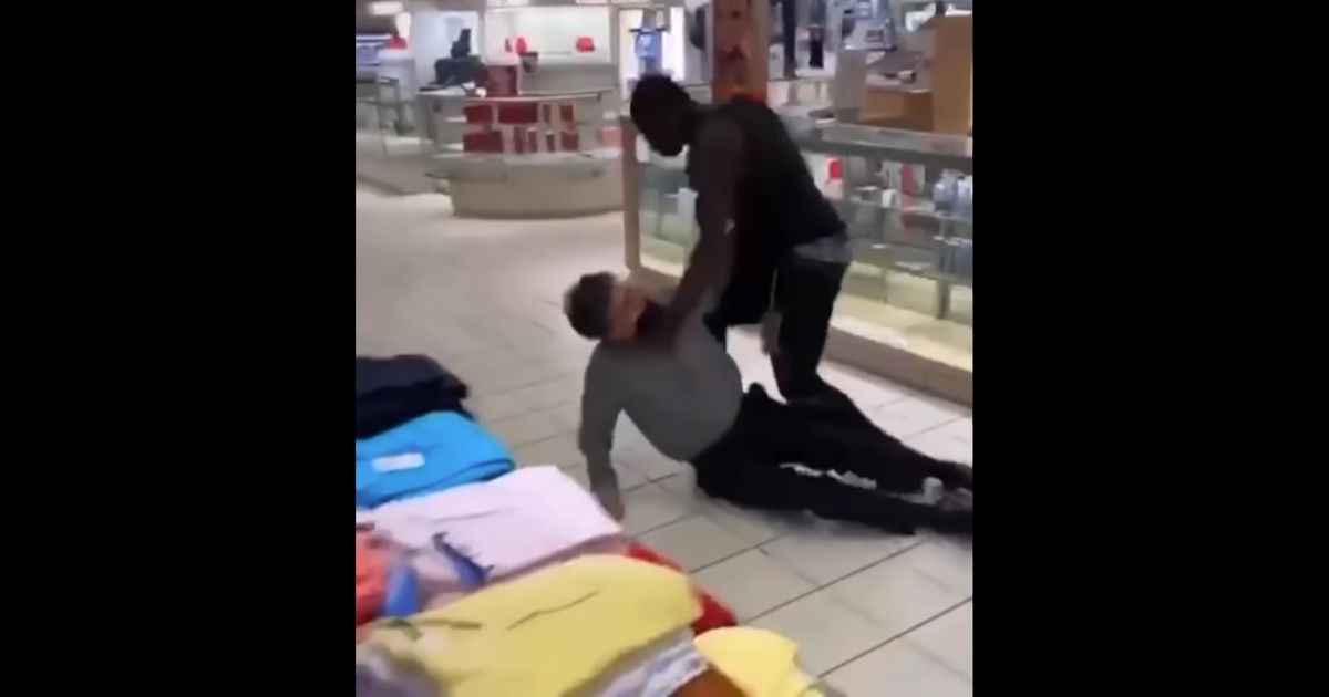 A man punches a Macy's employee in Flint, Michigan.