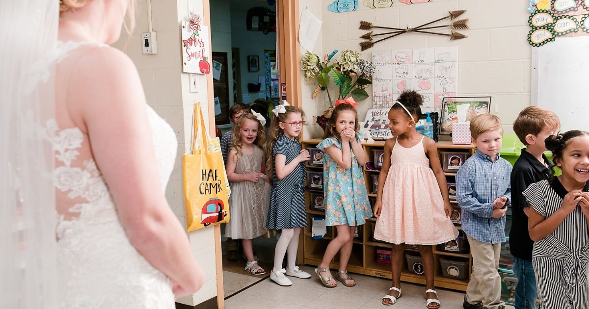The students got a sneak peek at their teacher's wedding dress and got to celebrate with her in their classroom.