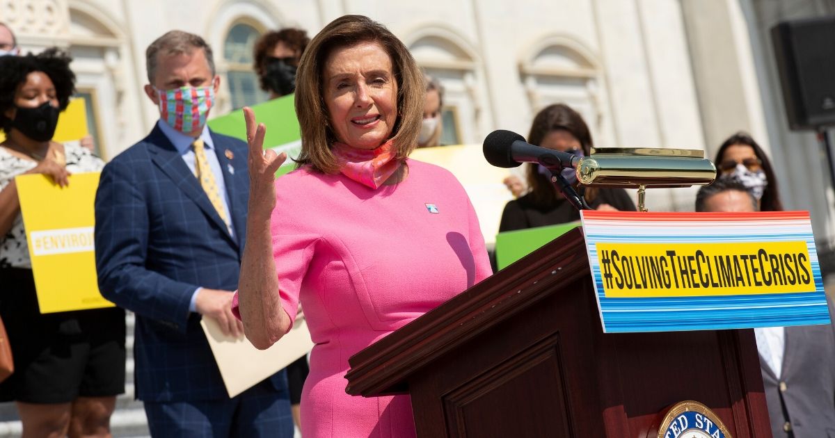Speaker of the House Nancy Pelosi delivers remarks during a press conference outside the U.S. Capitol on June 30, 2020, in Washington, D.C. Pelosi joined her Democratic colleagues to unveil a climate change action plan, which calls for government mandates, tax incentives and new infrastructure to bring the U.S. economy's greenhouse gas emissions to zero by 2050.