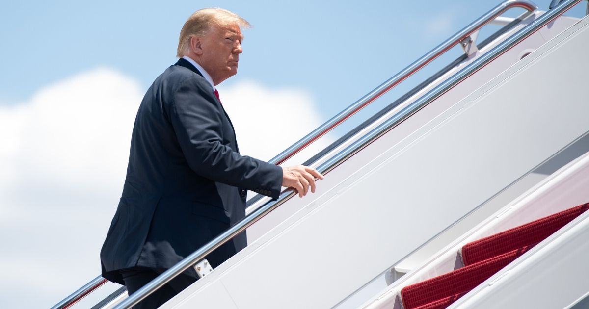 President Donald Trump boards Air Force One prior to departure from Joint Base Andrews in Maryland on June 25, 2020.